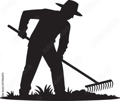 Black silhouette of a man wearing a hat raking leaves and grass in a garden gardener