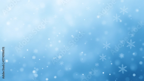 The image depicts a serene winter scene dominated by a soft blue gradient background, transitioning from a deeper blue at the top to a lighter, almost white hue towards the bottom