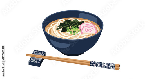 Japanese udon noodle soup in a dark blue bowl, with thick noodles, broth, narutomaki, wakame, and green onions. Chopsticks are on the side.