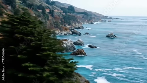 Dramatic coastal scenery showcases a rugged coastline with turquoise waters and towering cliffs.