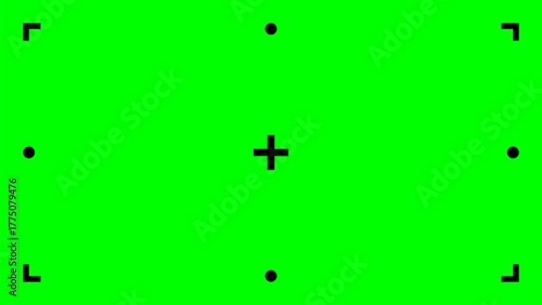 Green screen with central plus sign, four dots, and corner brackets, designed for chromakey tracking, motion capture, camera alignment, and VFX compositing precision.