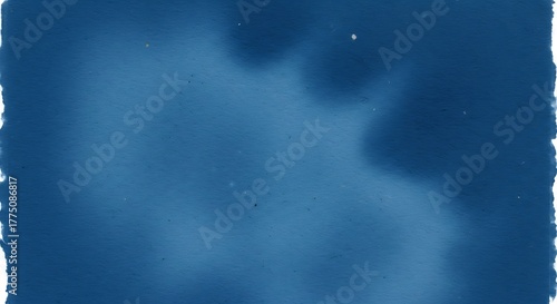 Cyanotype print with abstract shapes and textures on handmade paper