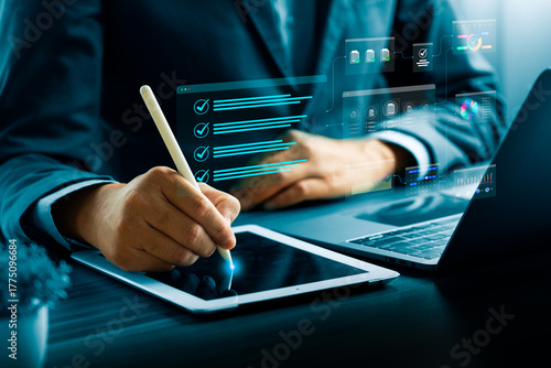 Digital checklist and task management concept with businessman using stylus on tablet to complete online workflow and project planning, representing productivity, organization, and business efficiency