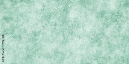 Abstract Elegant dark green background with mottled vintage texture in old fancy background design, texture of colored parchment paper.	
