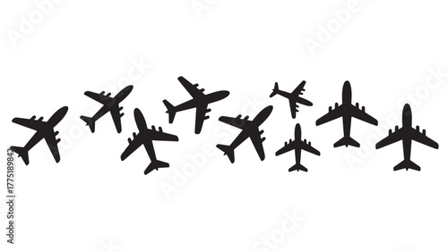 Set of airplane silhouettes vector illustration of flying aircraft in various sizes isolated on white background for travel and transportation concepts