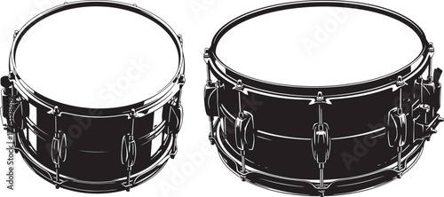 Two snare drums in a dark silhouette