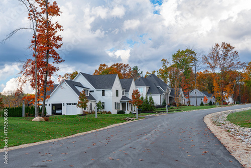 residential house with colorful autumn trees