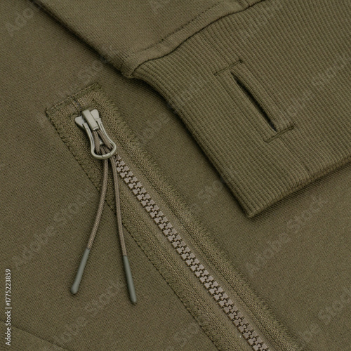 Close-Up of Khaki Sweatshirt Detail with Thumbhole Cuff and Zipper Pocket