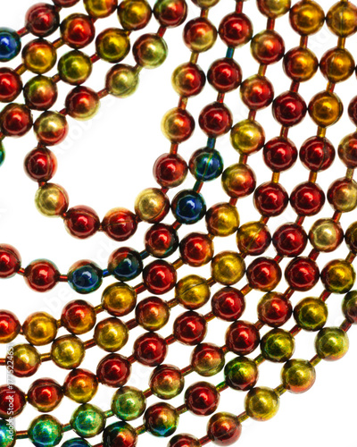 Metallic rainbow bead chain on white background