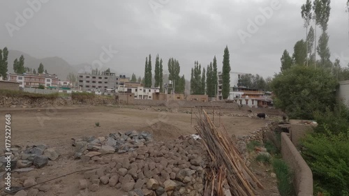 Dramatic time-lapse of rain and moving clouds over the mountains of Leh the capital of Ladakh, India, capturing the raw beauty of the Himalayan landscape.