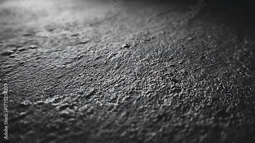 Dark Grey Textured Surface in Low Lighting Close Up Shot
