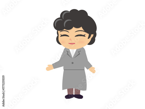 グレーのフォーマルスーツのパーマの女性