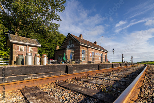 Obraz na plátně Railway tracks in front of the old Twisk station of the Hoorn–Medemblik steam tram