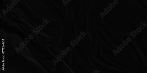 Black crumpled paper creased grunge texture. Paper wrinkled surface glued paper poster background.