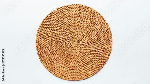 Round Rattan Wicker Placemat in an isolated setting with clean aesthetic and natural texture, suitable for food and drink background