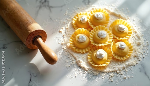 Homemade tortellini on marble kitchen counter. Pasta dough with flour, wooden rolling pin. Italian cuisine preparation with ravioli. Handmade process with stuffed pasta rings.