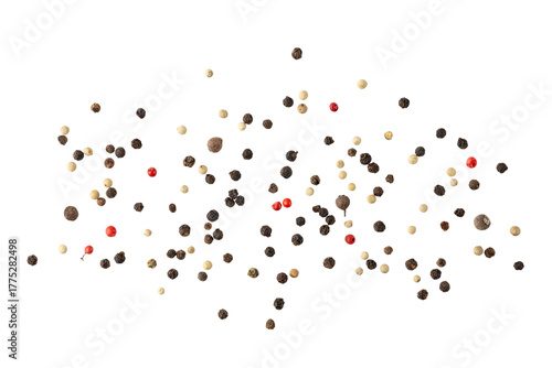 Dried mixed pepper flying isolated on white background. Aromatic spicy ingredient for cuisine.