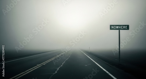 A desolate road stretching into a thick fog, with a signpost reading nowhere, creating a surreal and mysterious atmosphere of being lost or embarking on an uncertain journey
