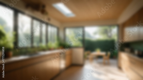 Blurred background of Minimal natural wood kitchen with skylight, green garden outside, morning, sunlight beams, 24mm lens, dolly-in, Fujicolor C200, shadows dancing, low angle.