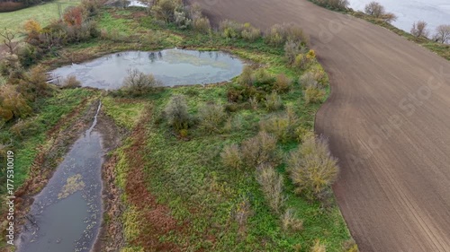 Aerial Vistula River farm land north Poland 1. Forests with rural farm agriculture farm landscape. Historic and economic basis of eastern Europe. Autumn fall colors. Rich agricultural heritage.