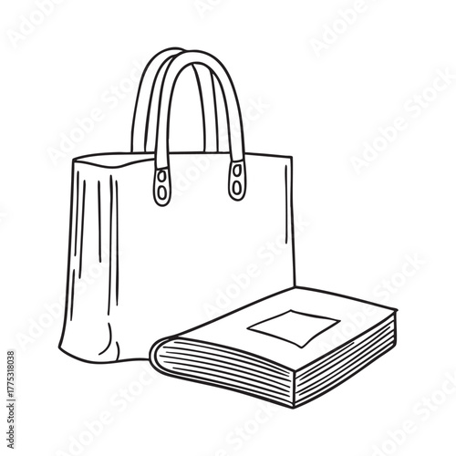 A magazine close to a tote bag with folded corners