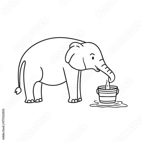 An elephant drinks in the zoo near a bucket