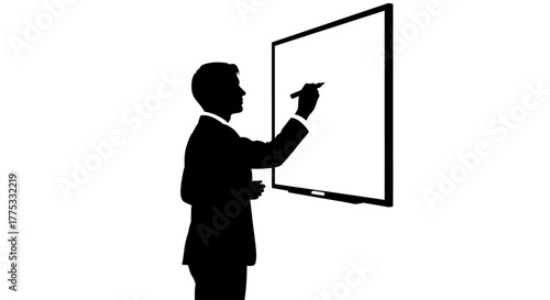 Silhouette of a businessman in a suit writing on a whiteboard during a presentation or meeting.