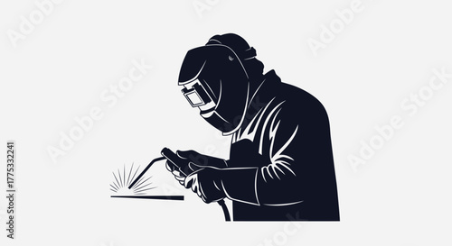 Silhouette of a welder wearing a protective mask and gloves, actively engaged in the process of welding metal with sparks flying.