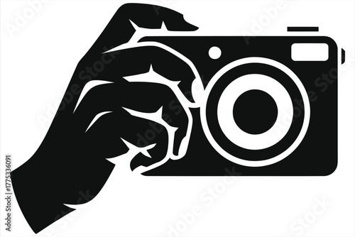 Hand holding compact camera silhouette point-and-shoot photographer taking photo black and white minimalist camera icon on white background handheld photography illustration for web branding editorial