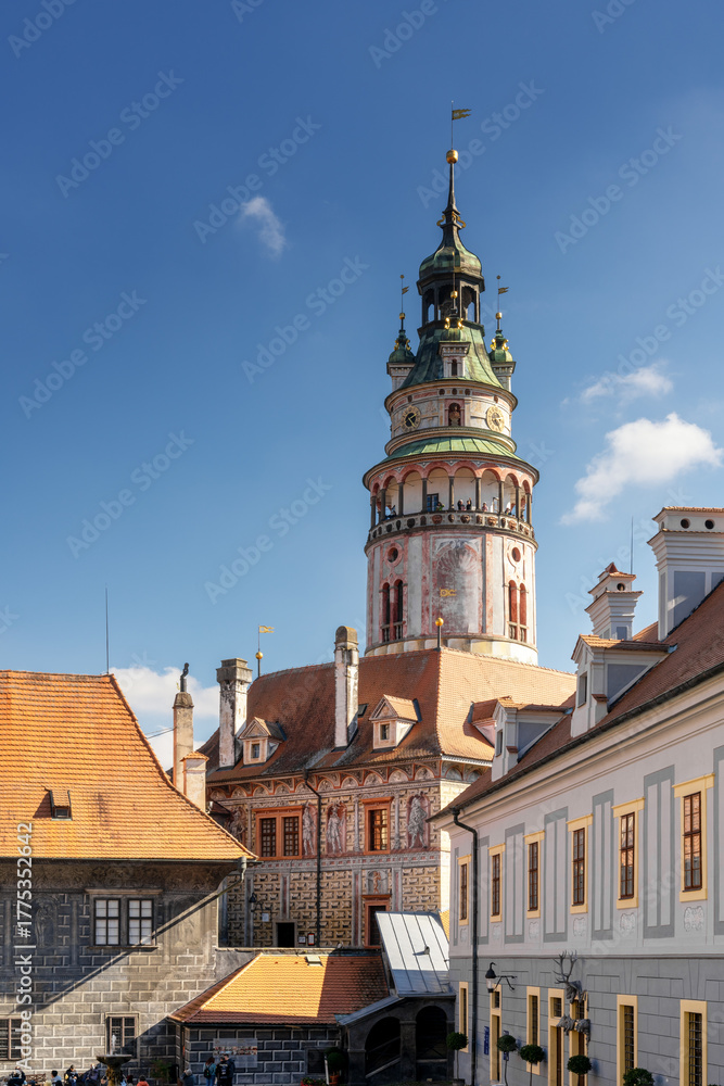 Obraz premium vertical view of the castle tower and colourful buildings in the historic city center of Cesky Krumlov