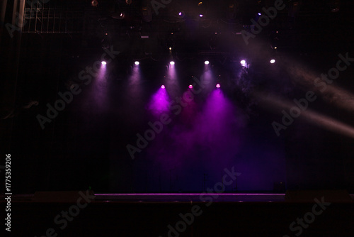 Theatrical scene without actors, scenic light and smoke