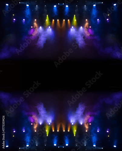 Spotlights in the concert hall. Stage light with colored spotlights and smoke.