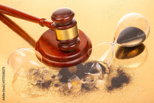 Broken hourglass and gavel symbolize the passage of time in legal proceedings