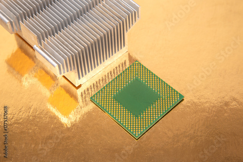 Advanced computer chip and heatsink displayed on a reflective surface in a tech setup