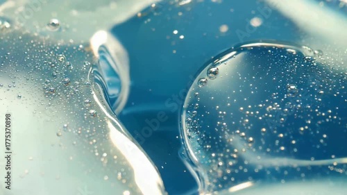 Closeup of Bubbles Forming in Clear Gel or Liquid with Smooth Flowing Motion