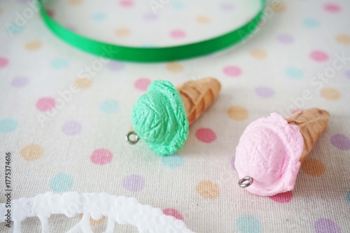 Colorful Miniature Ice Cream Cone Charms for DIY Jewelry and Crafts. Sweet Miniature Ice Cream Cones Flat Lay. Miniature Ice Cream Cone Charms Collection. 