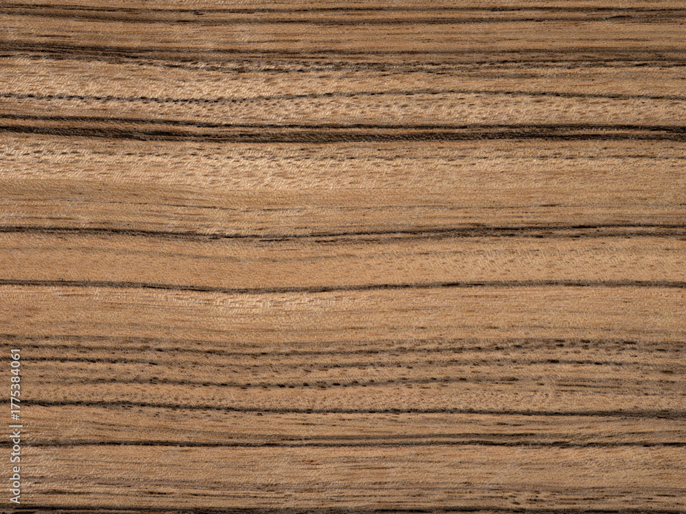 Naklejka premium Paldao veneer with pronounced stripes and rich wood texture
