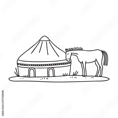 A yurt near a grazing horse on dry grass