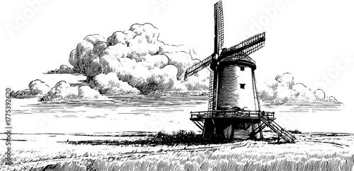 Vintage windmill in field with clouds above, hand drawn engraving for retro design