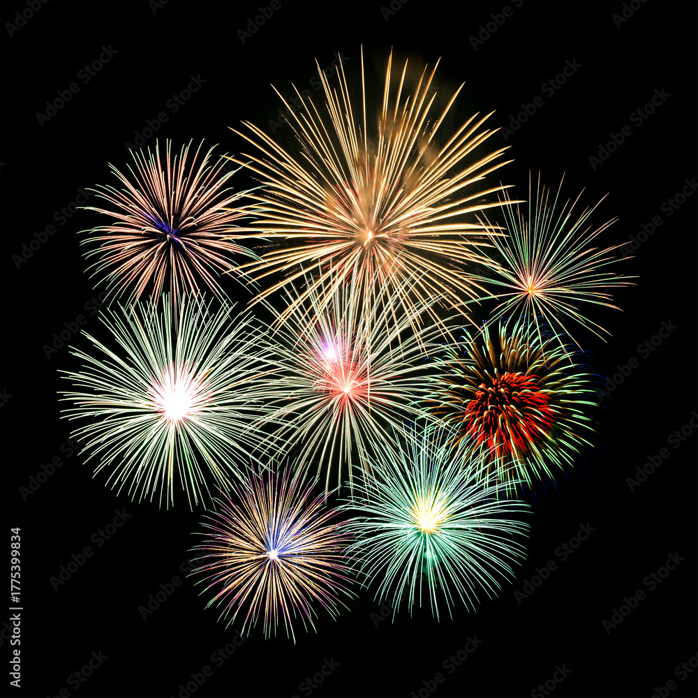 Fototapeta premium Fireworks of various colors and shapes burst in night sky