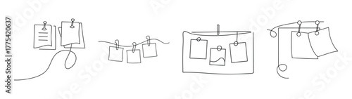 Office bulletin board pins holding notes and papers close up