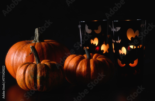 Pumpkins and tea light holders with funny eyes. 