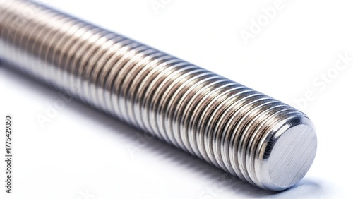 Close up view of a threaded metal rod isolated on white