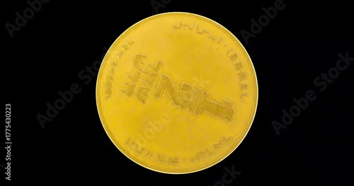 Reverse of Israel coin half new sheqel 1985, isolated in black background. Loopable animation in 4k resolution video