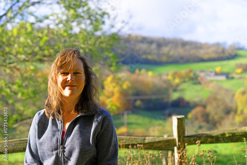 Woman in a park, in Snowshill, Broadway, in the Cotswolds.