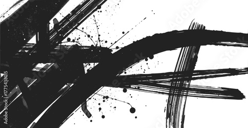 Abstract black ink brush strokes and splatters on