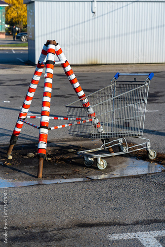 road construction site and a supermarket trolley