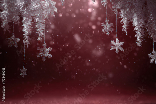 Festive winter scene with hanging snowflakes and a red background