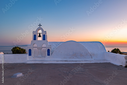 Фототапет church in oia village santorini greece