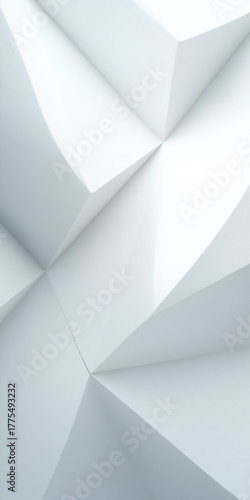 A white paper with a pattern of triangles. The paper is folded and has a unique design. The image has a modern and abstract feel to it